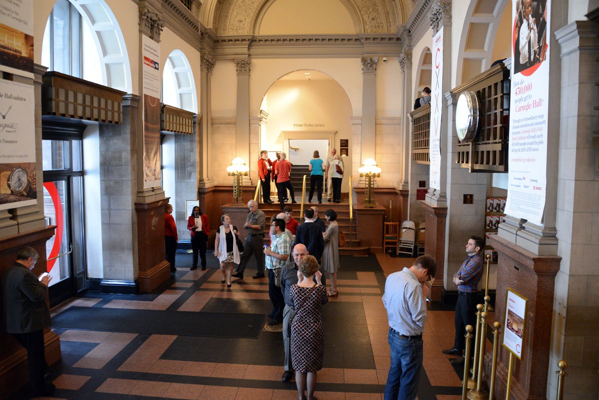 06 White Plaster and Gray Stone Of The Carnegie Hall Foyer Forms a Harmonious System of Round-headed Arched Openings and Corinthian Pilasters New York City